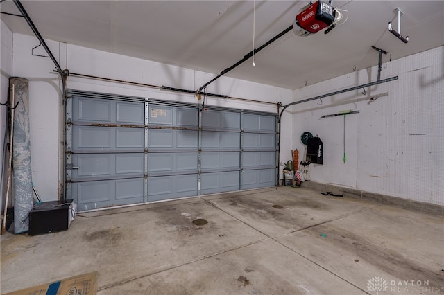 garage featuring a garage door opener