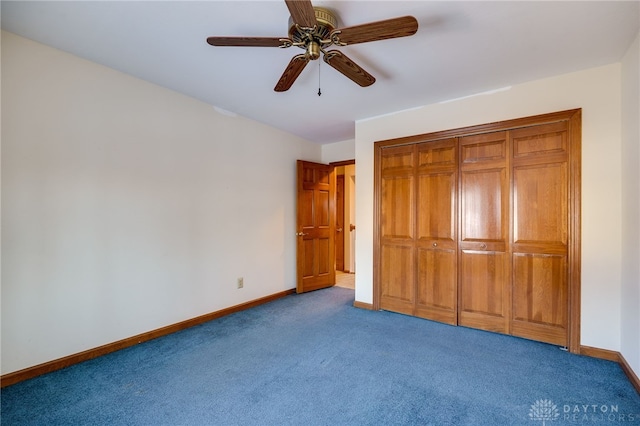 unfurnished bedroom featuring ceiling fan, light colored carpet, and a closet