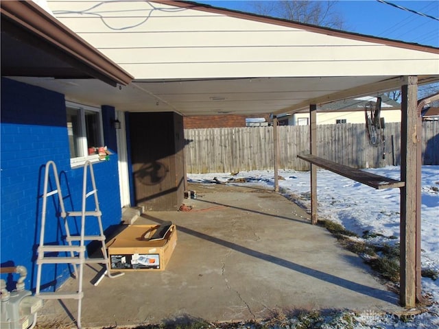 view of snow covered patio