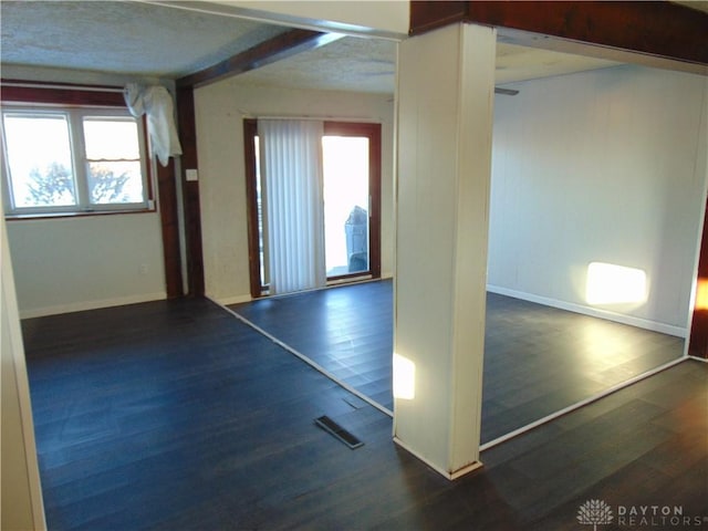 interior space featuring dark hardwood / wood-style flooring