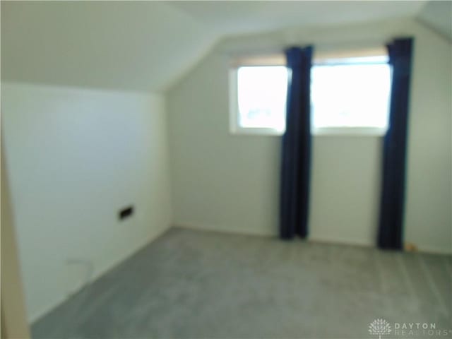 bonus room with vaulted ceiling