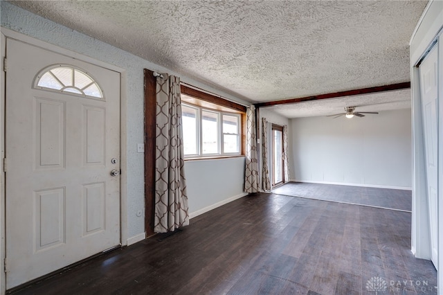 5254 Powell Rd, Dayton, OH 45424 - foyer featuring a textured ceiling, a ceiling fan, dark wood-style flooring, and baseboards