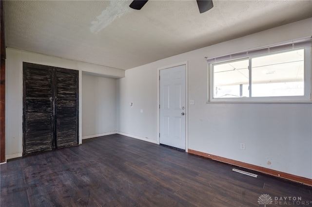 5254 Powell Rd, Dayton, OH 45424 - foyer entrance featuring wood finished floors, ceiling fan, baseboards, and a textured ceiling