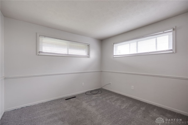 5254 Powell Rd, Dayton, OH 45424 - carpeted empty room with baseboards