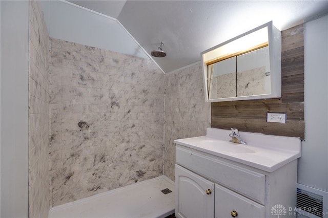 5254 Powell Rd, Dayton, OH 45424 - full bath with a tile shower, vanity, and lofted ceiling
