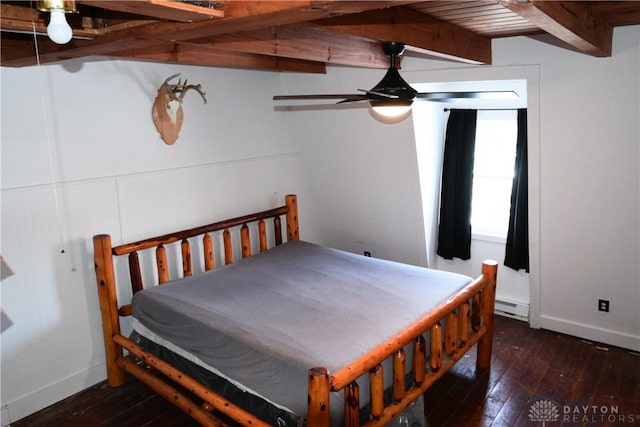 bedroom with ceiling fan, baseboard heating, dark hardwood / wood-style flooring, and beam ceiling