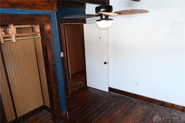 unfurnished bedroom featuring dark hardwood / wood-style floors