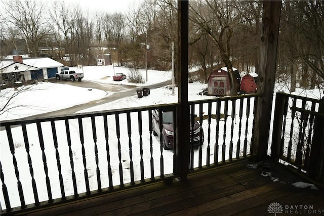 view of snow covered deck