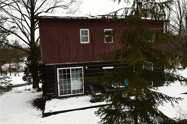 view of snow covered house