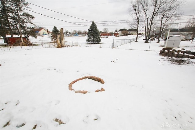 view of yard covered in snow