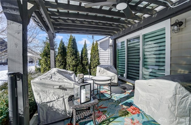 view of patio featuring a pergola and a grill