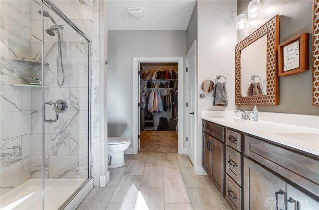 spacious closet with light colored carpet