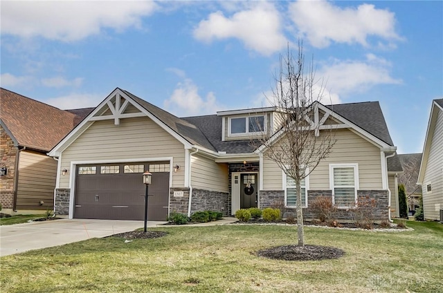 craftsman inspired home with a garage and a front yard