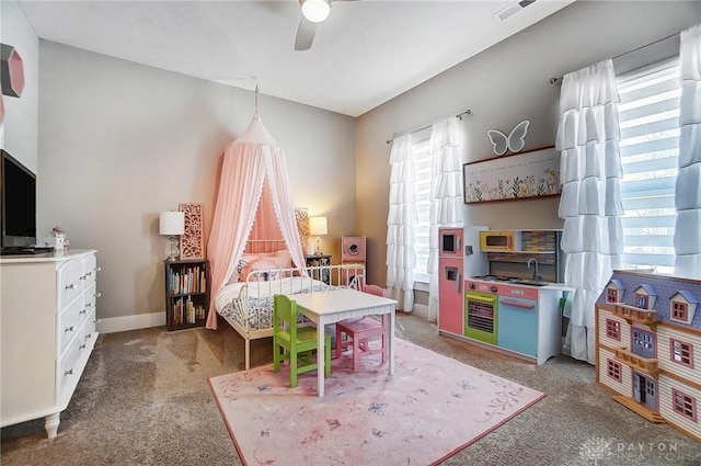 carpeted bedroom with ceiling fan