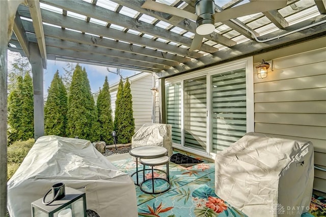 view of patio / terrace featuring a grill and a pergola