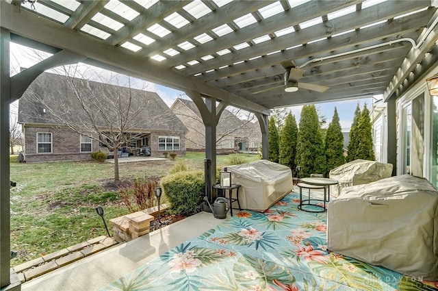 view of patio / terrace with a pergola and grilling area