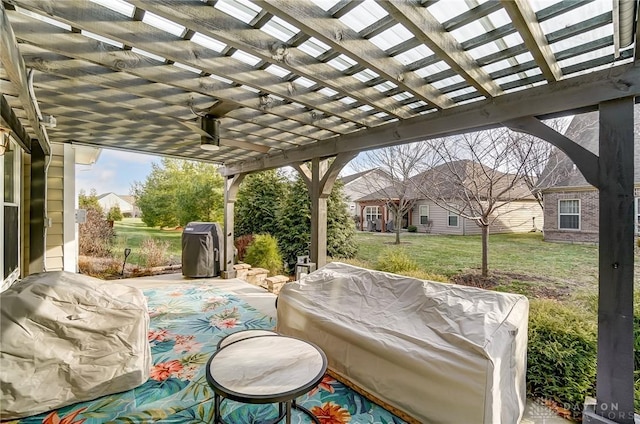 view of patio / terrace with area for grilling and a pergola