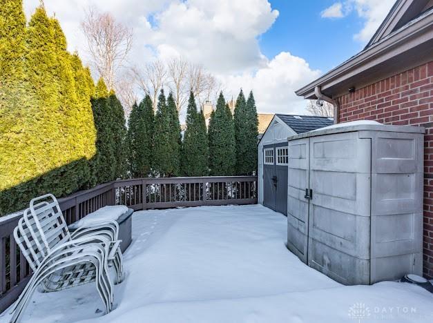 view of patio / terrace with a storage shed