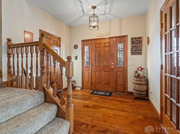 entryway featuring hardwood / wood-style flooring