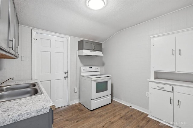 kitchen featuring vaulted ceiling, gray cabinets, sink, white electric range oven, and dark wood-type flooring