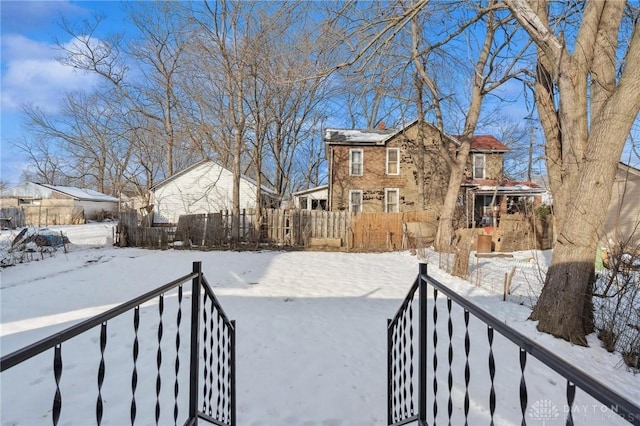 view of yard covered in snow