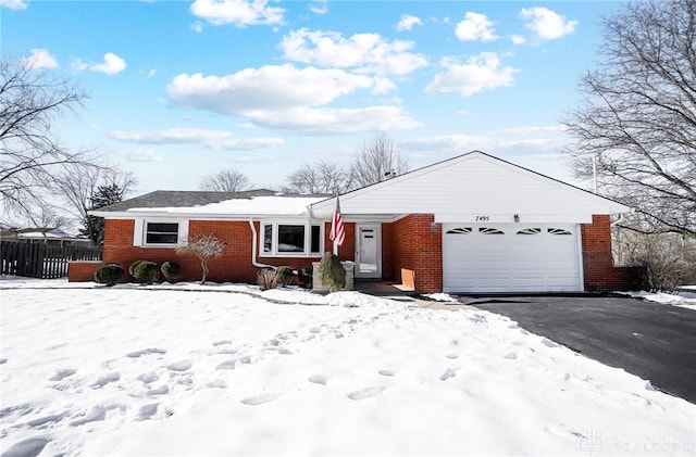 single story home featuring a garage