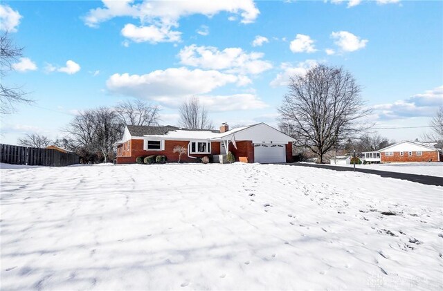 view of front of property featuring a garage