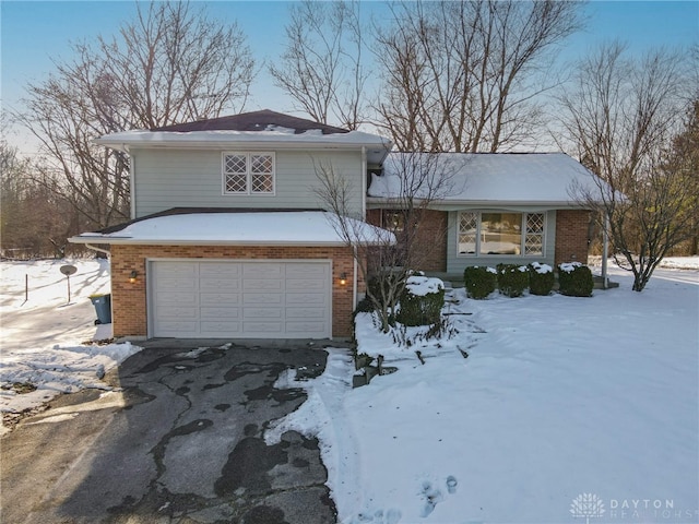 split level home featuring a garage