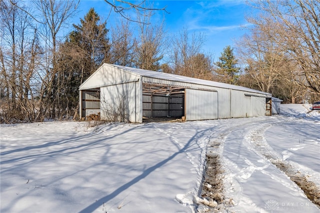 view of snow covered garage