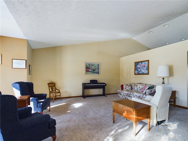 carpeted living room featuring lofted ceiling and a textured ceiling