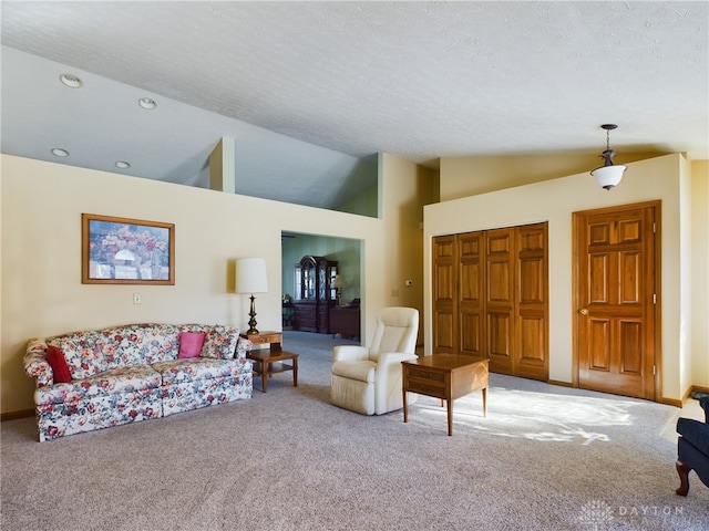 755 Willow Creek Way, Troy, OH 45373 - carpeted living area featuring recessed lighting, a textured ceiling, and high vaulted ceiling