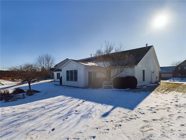 view of snow covered property