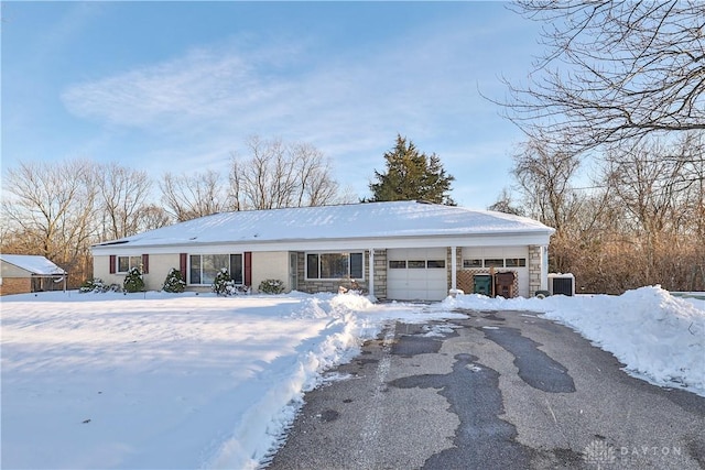 single story home with a garage