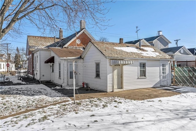 view of snow covered house