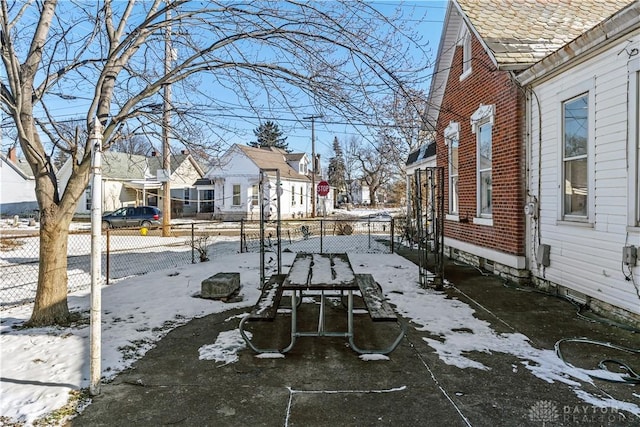 view of yard covered in snow