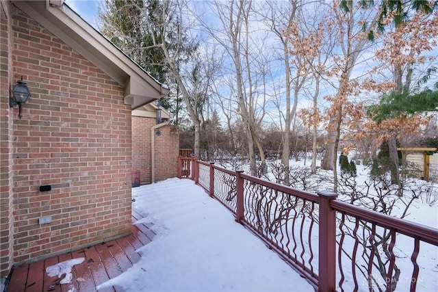 view of snow covered deck