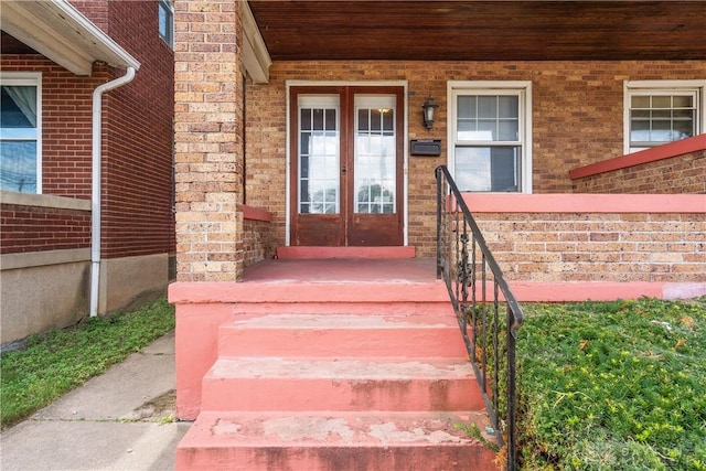 entrance to property featuring french doors