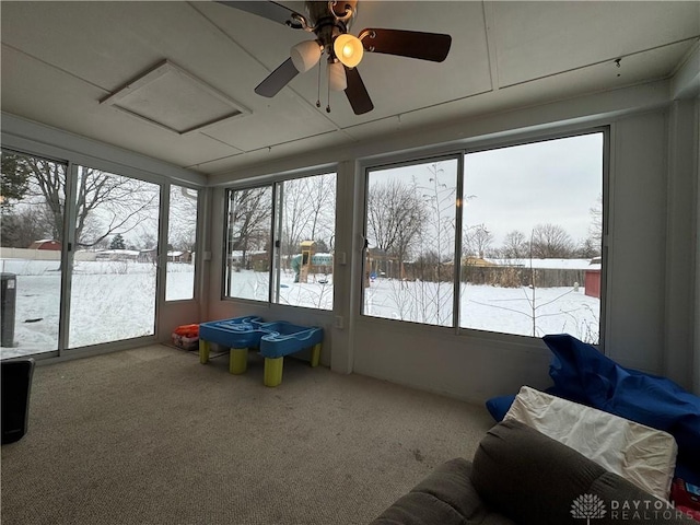 sunroom featuring a wealth of natural light