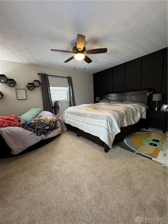 carpeted bedroom featuring ceiling fan