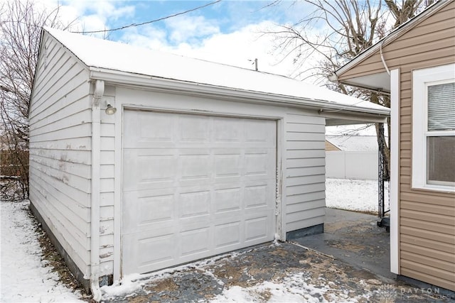 view of snow covered garage