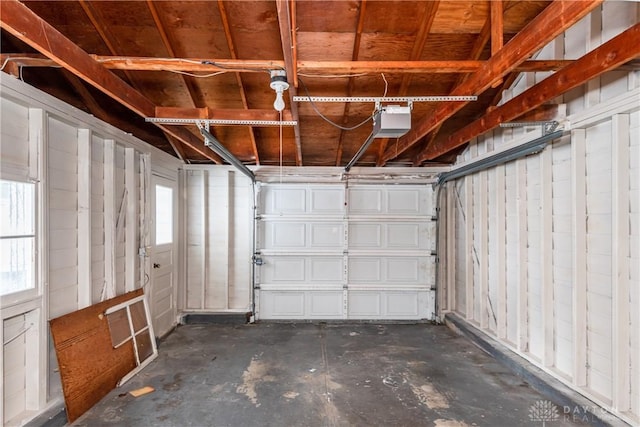 garage featuring a garage door opener