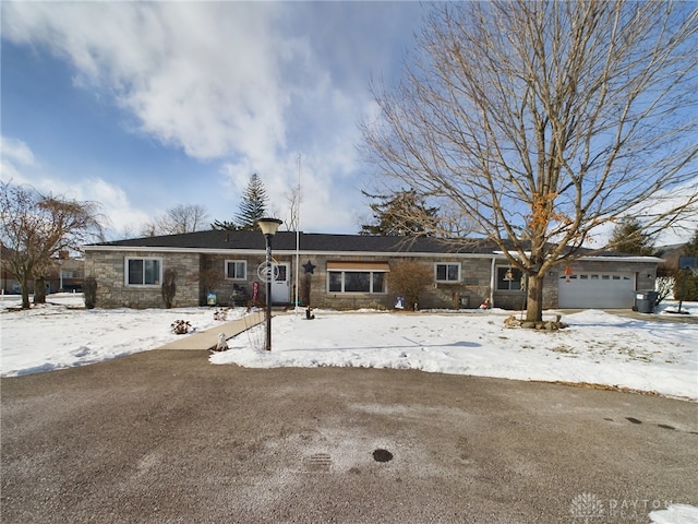 single story home with a garage