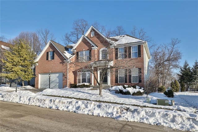 colonial home featuring a garage