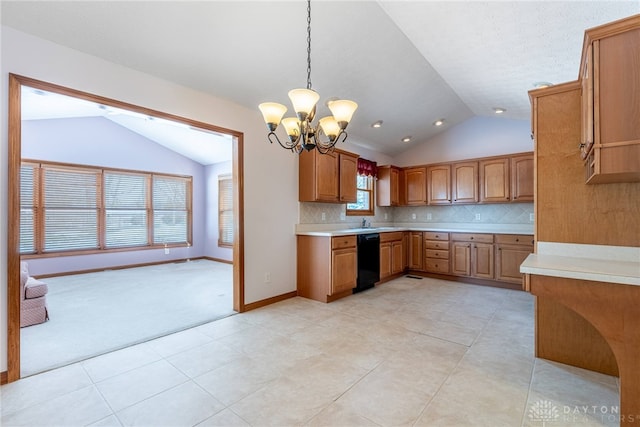 kitchen with dishwasher, hanging light fixtures, tasteful backsplash, a chandelier, and lofted ceiling