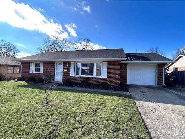 single story home with a front yard and a garage