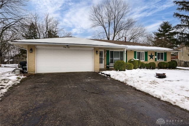 single story home with a garage