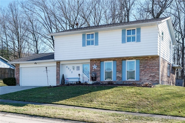 view of front of property with a garage and a front lawn