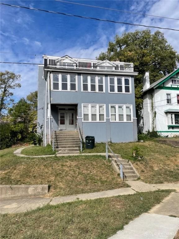 view of front of house with a front yard