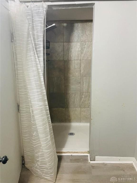 bathroom featuring walk in shower