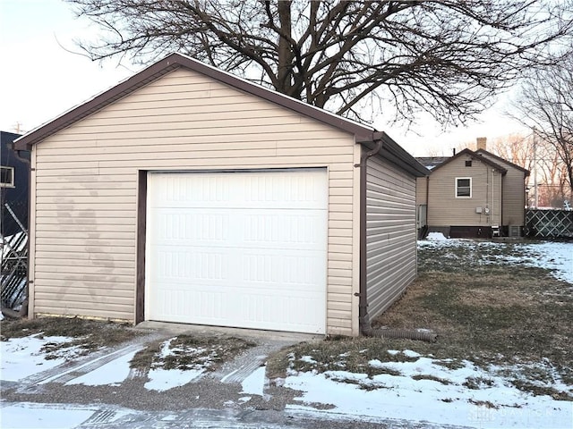 view of snow covered garage